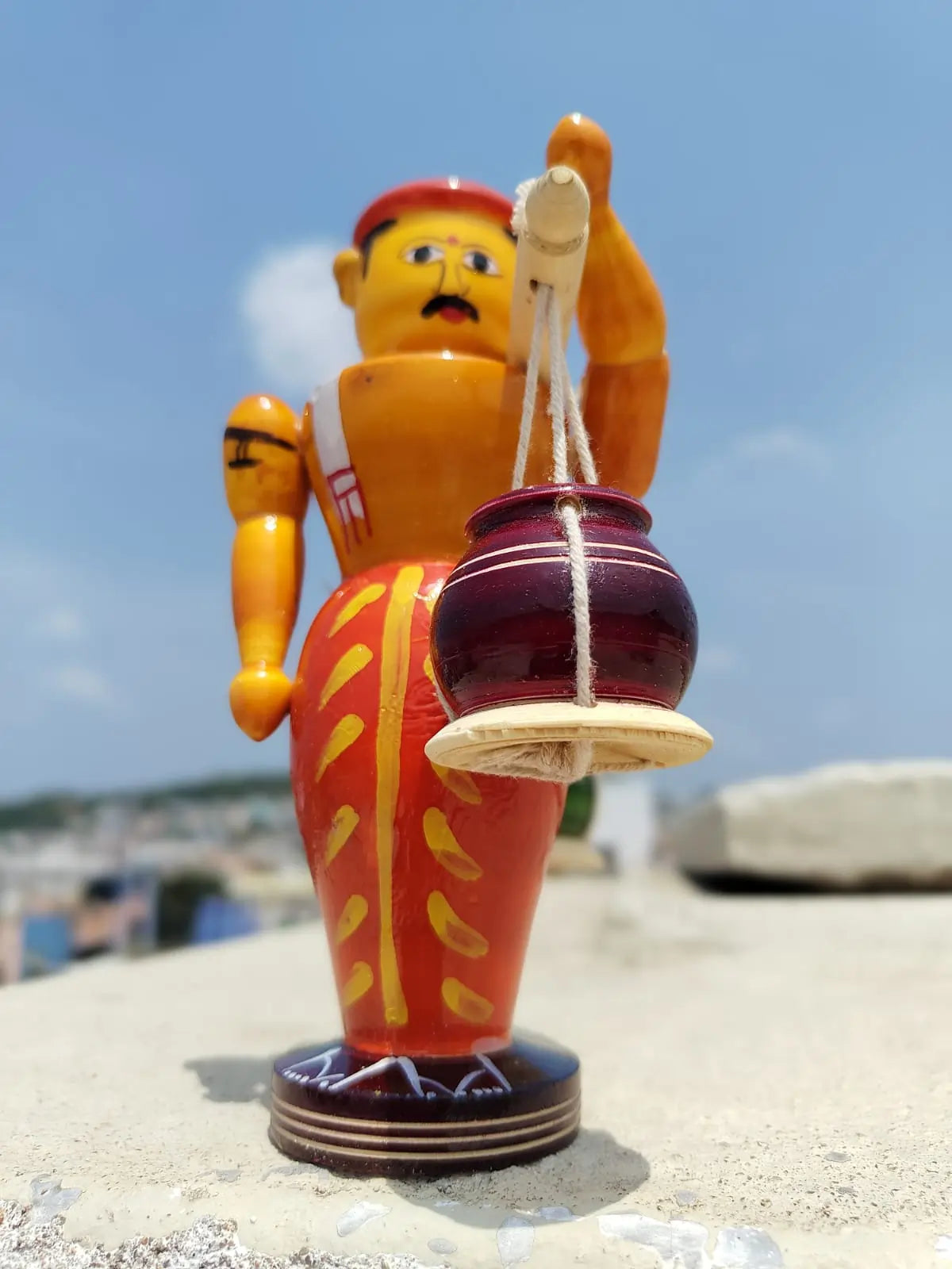 FARMER CARRYING POTS
